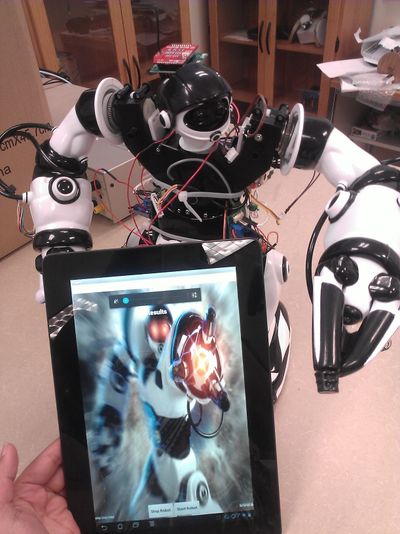 Figure 15: The final project for the class, illustrating the Robot and the Android Application.